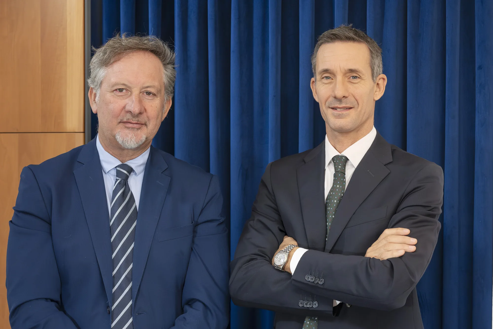 Flavio Farina e Andrea Dante in piedi insieme negli uffici di F.D.R.